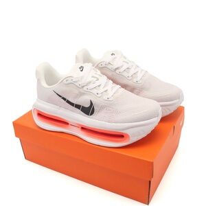 Nike Vomero Premium White and Red Athletic Shoes